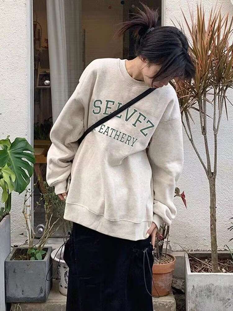 カジュアルコーデ  SELVEZプリントオーバーサイズスウェット